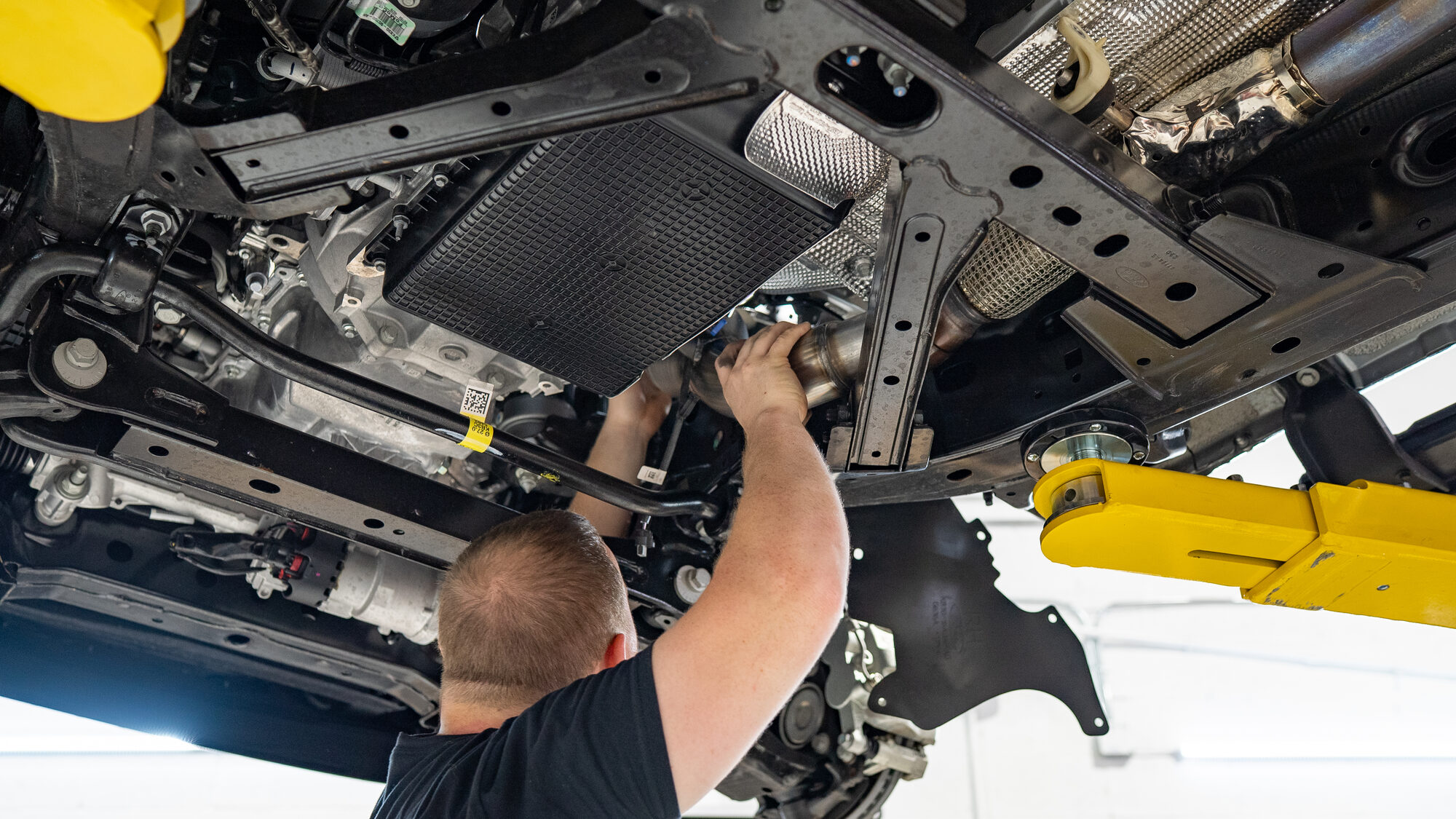 Test-fitting a component underneath a vehicle before final install